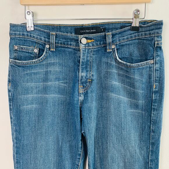Calvin Klein Size S8 L32 Women's Mid Rise Flare Jeans Faded Blue Pockets - Picture 3 of 9
